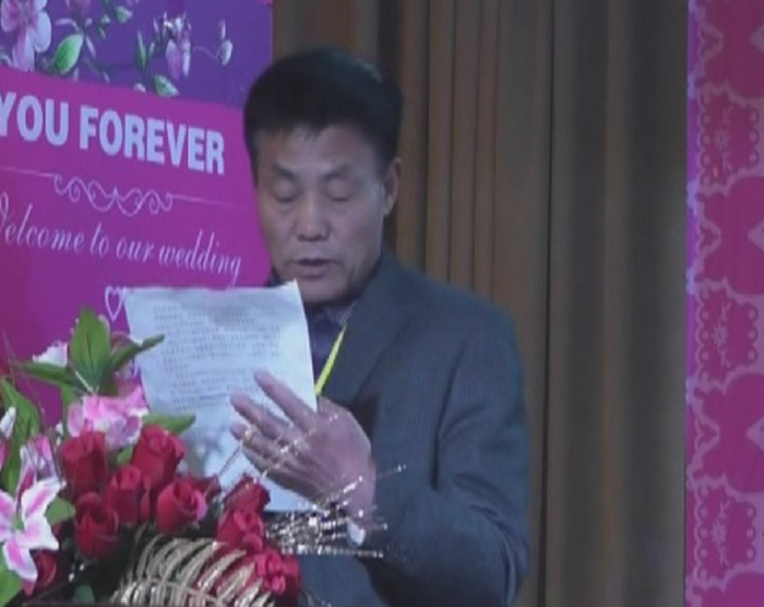 上届副会长汪连东宗亲向大会作《财务工作报告》