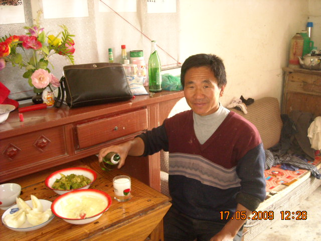 长子同兴在家耕和30多亩水田能收三万多斤水稻